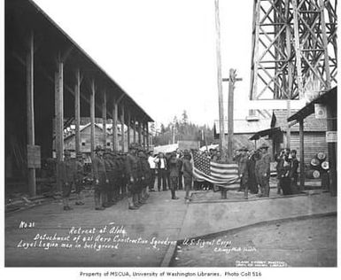 Spruce Production Division soldiers, with members of the Loyal Legion of Loggers and Lumbermen in background, Aloha, Grays Harbor County, Washington, approximately 1918