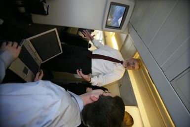 David Addington Talks With Derrick Morgan Aboard Air Force Two En Route to Guam