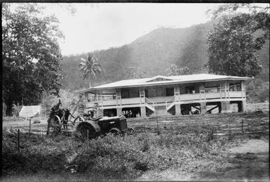 Tractor ploughing the front yard of Chinnery's house, Malaguna Road, Rabaul, New Guinea, ca. 1934 / Sarah Chinnery