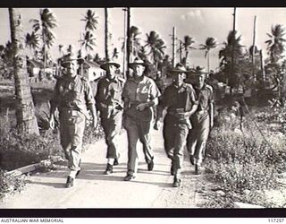 NAURU ISLAND. 1945-09-13. AUSTRALIAN ARMY OFFICERS MAKING AN INSPECTION OF THE ISLAND AT THE CONCLUSION OF THE JAPANESE SURRENDER CEREMONY