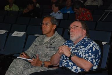 Hawaii, Aug. 23, 2012 -- Major General Darryl Wong and Governor Neil Abercrombie listen during the Hawaii National Disaster Recovery Framework rollout