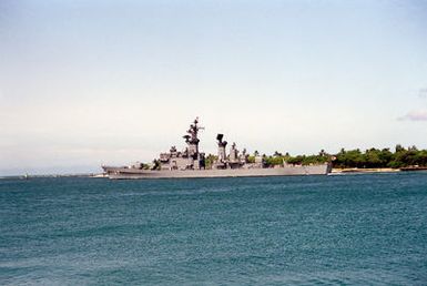 A port beam view of the Japanese destroyer ASAKAZE (DD 169) departing Pearl Harbor through the channel.