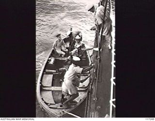 NAURU ISLAND. 1945-09-13. COLONEL V. FOX-STRANGWAYS, RESIDENT COMMISSIONER FOR THE GILBERT AND ELLIS ISLANDS, ABOUT TO BOARD THE ROYAL AUSTRALIAN NAVY VESSEL HMAS DIAMANTINA TO TAKE PART IN THE ..