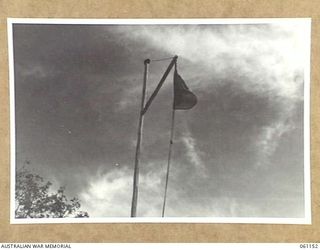 POM POM VALLEY, NEW GUINEA. 1943-12-03. BRIGADE COMMANDERS FLAG FLYING AT HEADQUARTERS, 18TH AUSTRALIAN INFANTRY BRIGADE