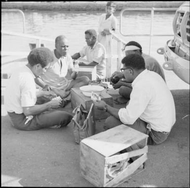 A group of Fijian men having kava, Nasalai, Fiji, 1966 / Michael Terry