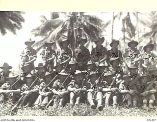 MADANG, NEW GUINEA. 1944-06-30. PERSONNEL OF NO.7 PLATOON A COMPANY, 24TH INFANTRY BATTALION. IDENTIFIED PERSONNEL ARE:- N267639 PRIVATE A.B. CLEMENTS (1); VX137834 PRIVATE E.W. SMYTH (2); N156891 ..