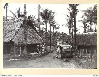 PALMALMAL PLANTATION, JACQUINOT BAY, NEW BRITAIN, 1945-08-14. THE VIEW IN THE HOSPITAL GROUNDS, 2/8 GENERAL HOSPITAL LOOKING TOWARDS THE ADMINISTRATIVE BUILDINGS