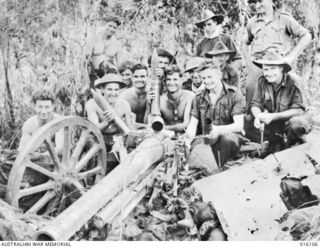 Finschhafen Area, New Guinea. 1943-09. A Japanese 75mm field gun which was in a position on the side of the Katika track within 100 yards of an infantry company fired only four rounds before ..