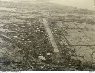 CAPE GLOUCESTER, NEW BRITAIN. C. 1944-03. AERIAL PHOTOGRAPH OF THE AIRSTRIP FROM WHICH NO. 78 (FIGHTER) WING RAAF OPERATED DURING 1944-03 TO 1944-04