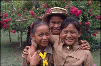 Three girls in 'Brownie' uniforms