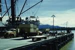 Loading export consignment of plywood at Lae Wharf (plywood made at Bulolo), Lae