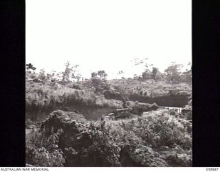 DONADABU, NEW GUINEA. 1943-10-07. A MOUNTAINOUS STRETCH OF ROAD BETWEEN DONADABU AND PORT MORESBY