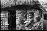 Babaimp: Kalam carriers and boys in front of a house