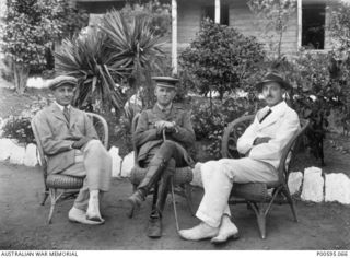 Portrait of Colonel Robert Sands (centre) and two permanent German officers captured in New Guinea, Captain von Klevitz and Lieutenant Meyer. (original album held in AWM archive store)