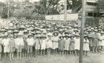 Pupils of the schools of Papeete gathered in a street