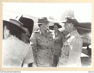 BOUGAINVILLE. 1945-03-31. LADY WAKEHURST (1), FAREWELLING LIEUTENANT GENERAL S.G. SAVIGE, GENERAL OFFICER COMMANDING 2 CORPS (2), AT PIVA AIRSTRIP, TOROKINA
