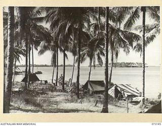 ALEXISHAFEN, NEW GUINEA. 1944-05-12. THE VIEW FROM THE NORTH SHORE OF ALEXISHAFEN LOOKING DUE SOUTH FROM VITAR PLANTATION TOWARDS SEK ISLAND, (EXTREME LEFT), MEGAR ISLAND (CENTRE), AND ..