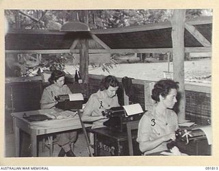 LAE, NEW GUINEA. 1945-05-15. AUSTRALIAN WOMEN'S ARMY SERVICE WORKING ON STAFF DUTIES AT HEADQUARTERS FIRST ARMY. A FEW DAYS AFTER THEIR ARRIVAL FROM AUSTRALIA AUSTRALIAN WOMEN'S ARMY SERVICE ..