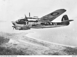 BRISTOL BEAUFORT, BELIEVED A9-551, OF NO 8 SQUADRON, RAAF, AFTER COMPLETING A BOMBING MISSION IN THE WEWAK AREA OF THE NORTH COAST OF NEW GUINEA. WEWAK CAPE JUST SHOWS IN THE CENTRE LEFT OF THE ..