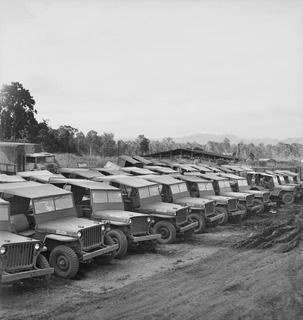 LAE, NEW GUINEA. 1944-09-27. A JEEP STORAGE PART AT THE 43RD FIELD ORDNANCE DEPOT