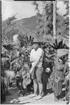 Pig festival, singsing, Kwiop: Edwin Cook among decorated dancers with feather headdresses and kundu drums