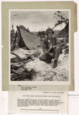 Coast Guard Combat Photographer Surveys Saipan Battleground