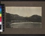 View of shoreline with houses, Mailu, Papua New Guinea, ca. 1905