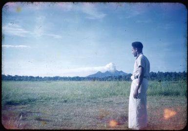 Albert Maori Kiki on his visit to see the rebuilding of the medical services with Mt. Lamington on the horizon, Popondetta, Papua New Guinea, 1951 / Albert Speer