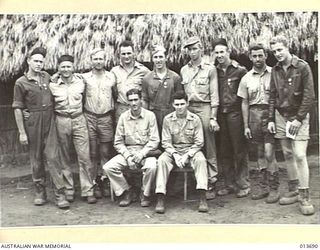 1942-11-28. NEW GUINEA. THIS FLYING FORTRESS CREW HAVE ALL BEEN PRESENTED WITH SILVER STARS FOR THEIR SUCCESSFUL ATTACK AGAINST THREE ENEMY WARSHIPS IN THE BUNA AREA. THEY SANK A DESTROYER. FRONT ..