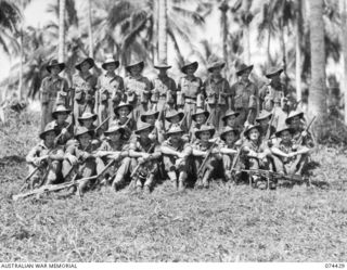 MADANG, NEW GUINEA. 1944-06-30. PERSONNEL OF NO. 11 PLATOON, B COMPANY, 24TH INFANTRY BATTALION. IDENTIFIED PERSONNEL ARE:- VX109151 LANCE CORPORAL K.G. WISEMAN (1); VX109129 PRIVATE W. LAUNDER ..