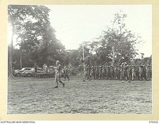 POM POM VALLEY, NEW GUINEA, 1944-02-16. NX8 LIEUTENANT-GENERAL SIR LESLIE MORSHEAD, KCB., KBE., CMG., DSO., ED., GENERAL-OFFICER-COMMANDING NEW GUINEA FORCE, TAKES THE SALUTE AS OFFICERS AND MEN OF ..