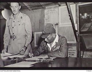 TOROKINA, BOUGAINVILLE. 1945-09-08. LIEUTENANT-GENERAL (LT-GEN) S. G. SAVIGE, GENERAL OFFICER COMMANDING 2 CORPS, ACCEPTED THE SURRENDER OF ALL JAPANESE FORCES ON BOUGAINVILLE FROM LT-GEN M. KANDA, ..