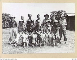 NADZAB, NEW GUINEA. 1945-09-14. MEMBERS OF 8 INDEPENDENT FARM PLATOON WITH THEIR OFFICER COMMANDING, LIEUTENANT S.O.W. SKINNER, CENTRE FRONT ROW