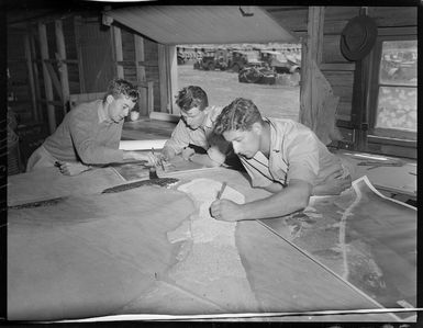 New Zealand Divisional Engineers preparing a scale model of Nissan Island, Papua New Guinea, during World War II