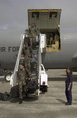 US Air Force (USAF) Airmen deplane from a USAF KC-135 Stratotanker from Kadena Air Base (AB), Japan, at Andersen Air Force Base (AFB), Guam, in support of Exercise COPE NORTH. COPE NORTH is an exercise in which US Air Force, US Marines, and the Japanese Air Self Defense Force (JASDF) participate in joint training