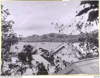 PORT MORESBY - PORT MORESBY HARBOUR FROM AIR FORCE H.Q. LOOKING TOWARDS HANUABADA, ON RIGHT EXTREMITY OF HARBOUR. RAAF SURVEY FLIGHT. (NEGATIVE BY N. TRACY)