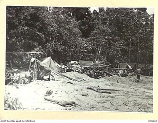 BOUGAINVILLE ISLAND, 1945-01-21. A SECTION OF THE 25TH POUNDER GUN EMPLACEMENTS OF NO.4 BATTERY 2ND FIELD REGIMENT