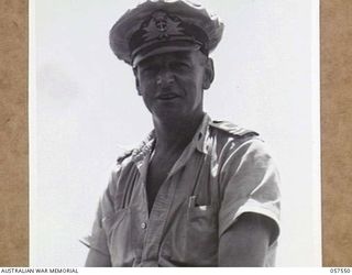 MOROBE, NEW GUINEA, 1943-09-18. LIEUTENANT H.L. BILLMAN, ROYAL AUSTRALIAN NAVY VOLUNTEER RESERVE, NAVAL BOMB DISPOSAL OFFICER, BOUND FOR LAE WHERE HE WILL TAKE UP DUTY