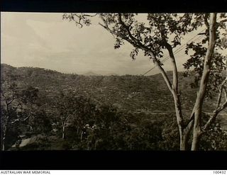 Port Moresby, New Guinea. 1944-05-08. An elevated view of the New Guinea Force camp at Four-mile on the Port Moresby-Boroko-Taruha Road, viewed from Pyramid Hill
