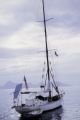 French Polynesia, 'Nomad' sailboat anchored off shore of Tahiti Island