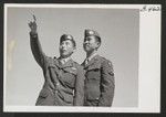 T/C Kazuo Yoshida (left) and T/C Clarence Ota (right) visit Heart Mountain. They are originally from Hawaii--volunteered for the 442nd