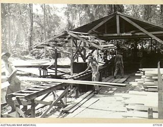 BOUGAINVILLE ISLAND, 1944-11-17. THE SAWMILL, OF THE 2/2ND FORESTRY COMPANY. IDENTIFIED PERSONNEL IS:- VX90808 SAPPER M.F. CONDRON (2)