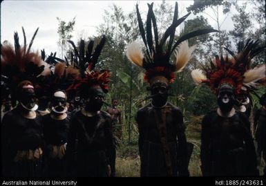 Men wearing ceremonial dress