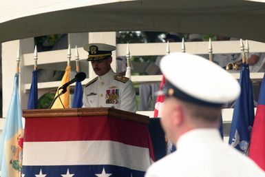 US Navy (USN) Rear Admiral (RADM) Michael C. Vitale, Commander, Navy Region Hawaii / Commander, Navy Surface Group, gives introductory remarks during a Unit Integration Ceremony at Pearl Harbor Naval Base, Hawaii (HI). During the Ceremony the Naval Dental Center Pearl Harbor and Naval Medical Clinic Pearl Harbor, merged to become the Naval Health Clinic Hawaii
