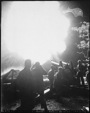 Night firing of 155mm rifle. Guam, July 29, 1944