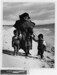 Sister Adrienne Mundy, MM, with Bolo and Conchita on Kihei Beach, Hawaii, 1944