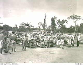 THE SOLOMON ISLANDS, 1945-10-18. JAPANESE SERVICE PERSONNEL AT THEIR INTERNMENT CAMP AT TOROKINA, BOUGAINVILLE ISLAND. (RNZAF OFFICIAL PHOTOGRAPH.)