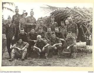 Group portrait of members of a Signal Troop of the 2/10th Commando Squadron. Identified, left to right, back row: NX12820 Corporal (Cpl) J Boyd, of Sydney, NSW (partially obscured); WX10895 Lance ..