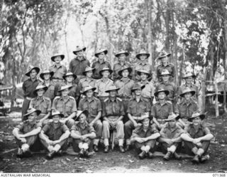KILIGIA, NEW GUINEA, 1944-03-16. QX36344 BRIGADIER G.V. MORIARTY, MC, VD, COMMANDER ROYAL ARTILLERY (10), WITH HIS MEN AT HEADQUARTERS, ROYAL AUSTRALIAN ARTILLERY, 5TH DIVISION. IDENTIFIED ..