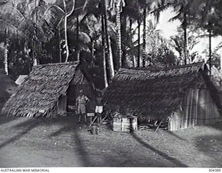 ORO BAY, NEW GUINEA. 1943-01. THE NAVY OFFICE AND BEACHMASTER'S RESIDENCE, BUILT IN TRADITIONAL NATIVE STYLE. (NAVAL HISTORICAL COLLECTION)